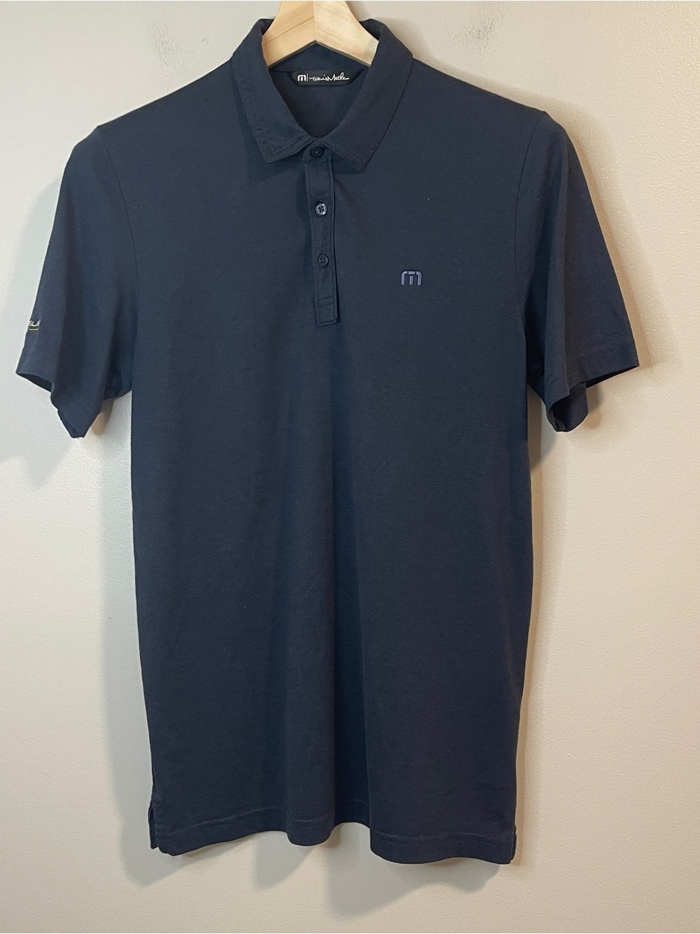 Travis Mathew Navy Polo with Subtle Logo